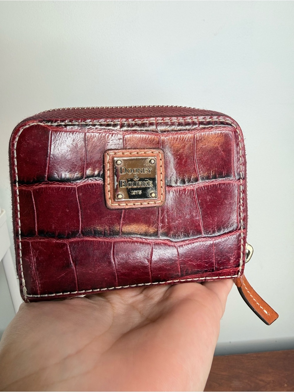Dooney & Bourke Burgundy Croc-Embossed Zip Around Wallet with Tan Trim